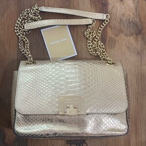 Michael Kors Med Tina Convertible Pale Gold Flap Flip Lock Embossed Leather Bag